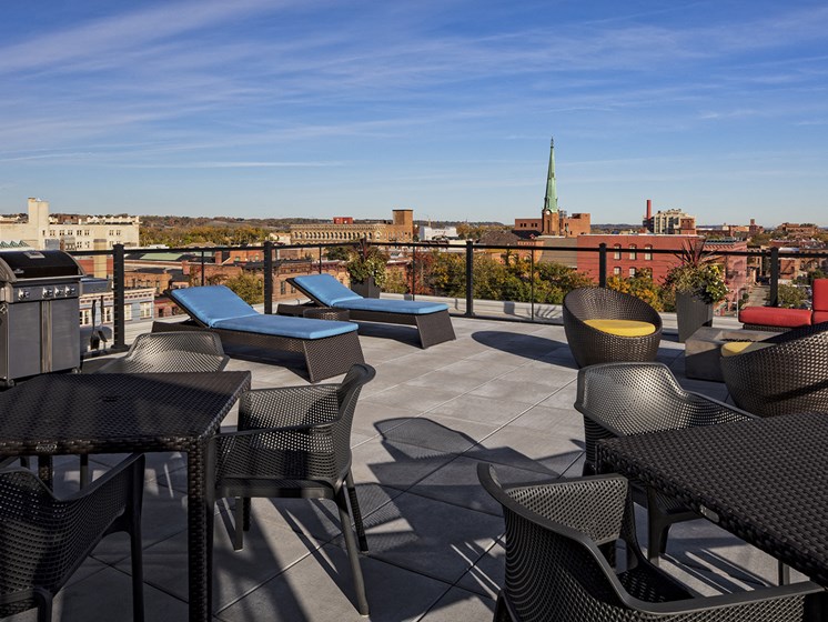 Rooftop Deck with Gas Fire Pit and Grilling Station at The News Apartments in Troy, NY